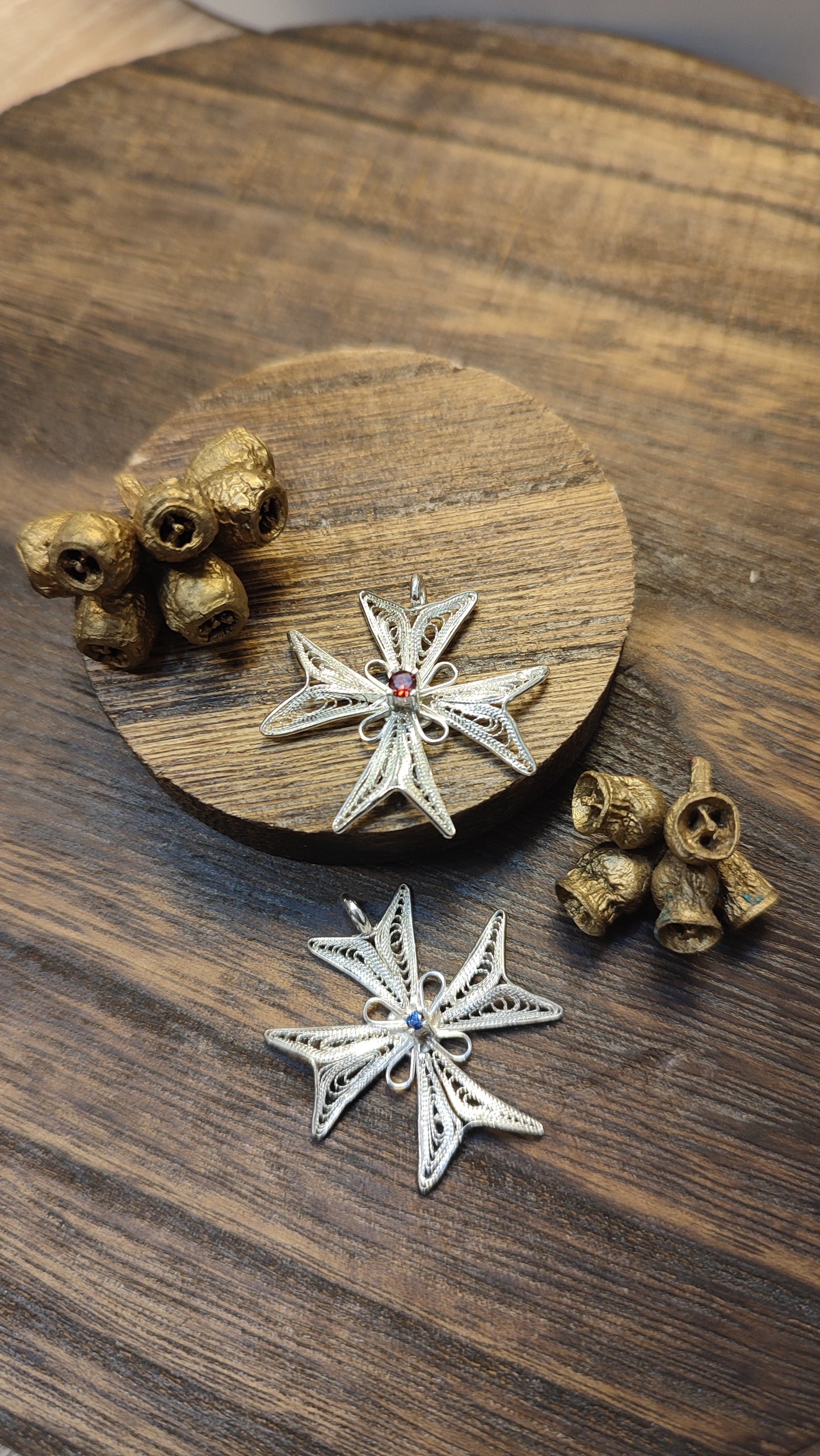 Maltese cross with stone