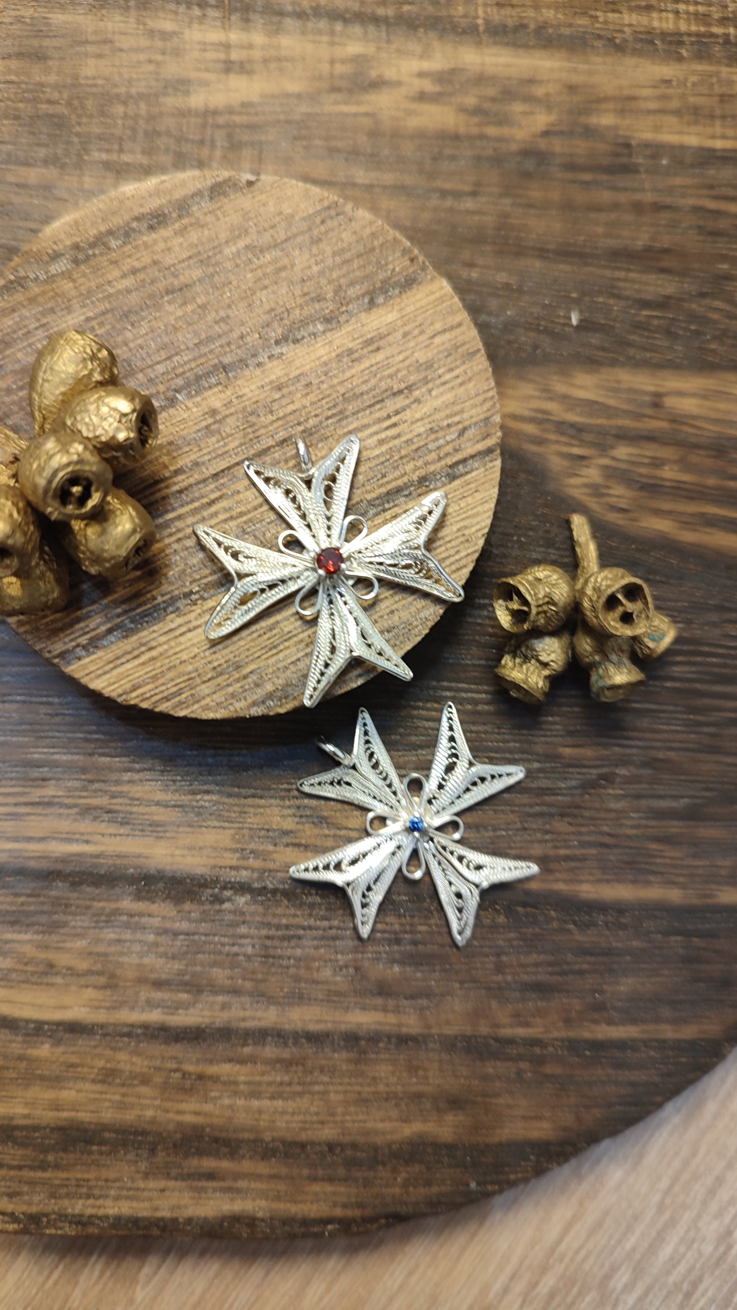 Maltese cross with stone